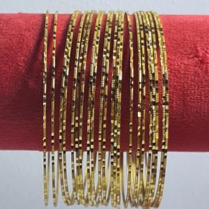 Multi pieces gold plated bangle. Size 12